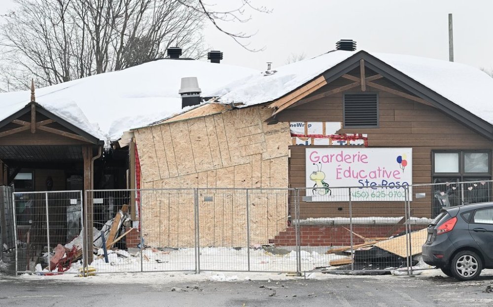 The aftermath of a bus crash outside a daycare centre in Laval, Que., is shown on Feb. 9, 2023. THE CANADIAN PRESS/Graham Hughes