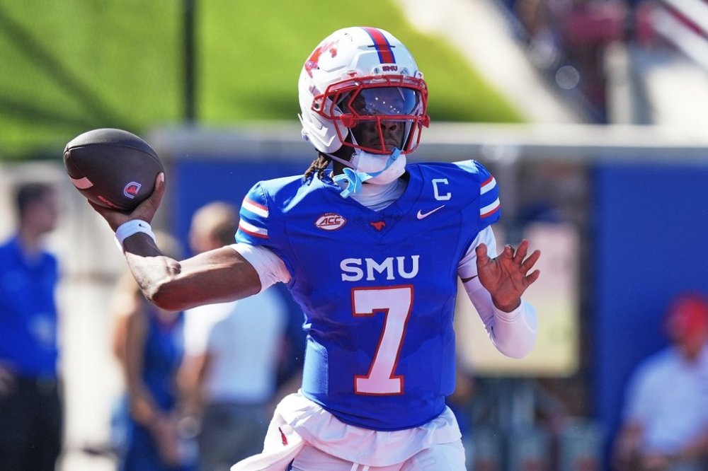 SMU quarterback Kevin Jennings (7) passes during the first half of an NCAA college football game against Syracuse, Saturday, Oct. 4, 2025, in Dallas. (AP Photo/LM Otero)