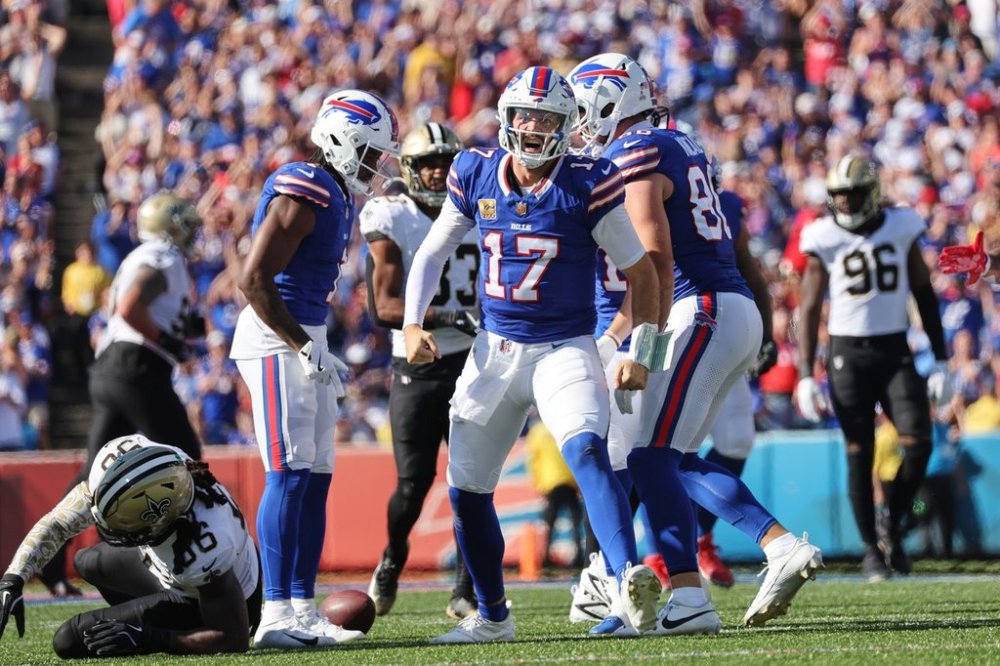 Buffalo Bills quarterback Josh Allen (17) celebrates a first down carry in the second half of an NFL football game against the New Orleans Saints, Sunday, Sept. 28, 2025, in Orchard Park, N.Y. (AP Photo/Jeffrey T. Barnes)