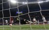 FILE - Tottenham goalkeeper Hugo Lloris fails to stop a shot from Liverpool's Divock Origi for the second goal during the Champions League final soccer match between Tottenham Hotspur and Liverpool at the Wanda Metropolitano Stadium in Madrid, June 1, 2019. (AP Photo/Manu Fernandez, File)
