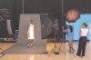 New Orleans Pelicans forward Zion Williamson poses for photos while a crew from local WGNO News films him, during the teams NBA basketball media day in Metairie, La., Tuesday, Sept. 23, 2025. (AP Photo/Gerald Herbert)