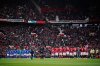 Players attend a minute's silence to honor the victims of Thursday's terrorist attack in the city prior to the English Premier League soccer match between Manchester United and Sunderland at Old Trafford stadium in Manchester, England, Saturday, Oct. 4, 2025. (AP Photo/Dave Thompson)