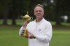 2025 European Ryder Cup Captain, Luke Donald poses with the trophy before a practice round for the Ryder Cup golf tournament, Tuesday, Sept. 23, 2025, in Farmingdale, N.Y., at Bethpage State Park's Black Course. (AP Photo/Matt Slocum)