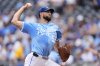 Kansas City Royals starting pitcher Michael Wacha throws during the first inning of a baseball game against the Detroit Tigers, Sunday, Aug. 31, 2025, in Kansas City, Mo. (AP Photo/Charlie Riedel)