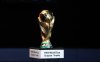 FILE - A Friday Dec. 1, 2017 file photo of the World Cup trophy placed on display during the 2018 soccer World Cup draw in the Kremlin in Moscow. Morocco has touted its limited threat from gun crime in a 2026 World Cup bidding proposal to take on the United States-led rival for the 2026 soccer showpiece. The North African nation highlights safety for visiting fans in bidding documents published by FIFA on Monday that do however show every stadium and training ground requires building work. (AP Photo/Pavel Golovkin, File)