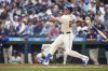 Seattle Mariners' Cal Raleigh hits his 54th home run of the season, a two-run home run to tie Mickey Mantle for most home runs by a switch-hitter in a single season, against the Los Angeles Angels during the first inning of a baseball game Sunday, Sept. 14, 2025, in Seattle. (AP Photo/Lindsey Wasson)