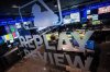 FILE - An employee works a support station inside the Replay Review room at Major League Baseball headquarters in New York, Tuesday, March 28, 2023. (AP Photo/John Minchillo, File)