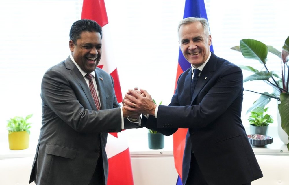 Prime Minister Mark Carney takes part in a meeting with Laurent Saint-Cyr, president of the Transitional Presidential Council of the Republic of Haiti, during the United Nations General Assembly (UNGA) in New York on Tuesday, Sept. 23, 2025. THE CANADIAN PRESS/Sean Kilpatrick
