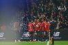 Lille's Ethan Mbappe, centre, celebrates with teammates after scoring his side's opening goal during the French League One soccer match between Lille and Paris Saint-Germain at the Stade Pierre-Mauroy in Villeneuve-d'Ascq, outside Lille, France, Sunday, Oct. 5, 2025. (AP Photo/Jean-Francois Badias)