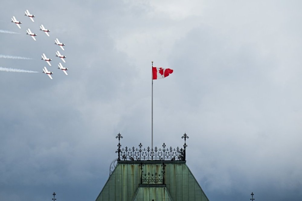 Royal Canadian Air Force (RCAF) Snowbirds conduct a flypast over East Block on Parliament Hill during Canada Day celebrations at LeBreton Flats in Ottawa, on Tuesday, July 1, 2025. THE CANADIAN PRESS/Spencer Colby