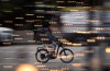 Today, food delivery apps may be a misnomer, said Vince Sgabellone, food service industry analyst for research firm Circana. A food delivery worker rides a bike in downtown Vancouver, B.C., Thursday, Dec. 23, 2021. THE CANADIAN PRESS/Darryl Dyck