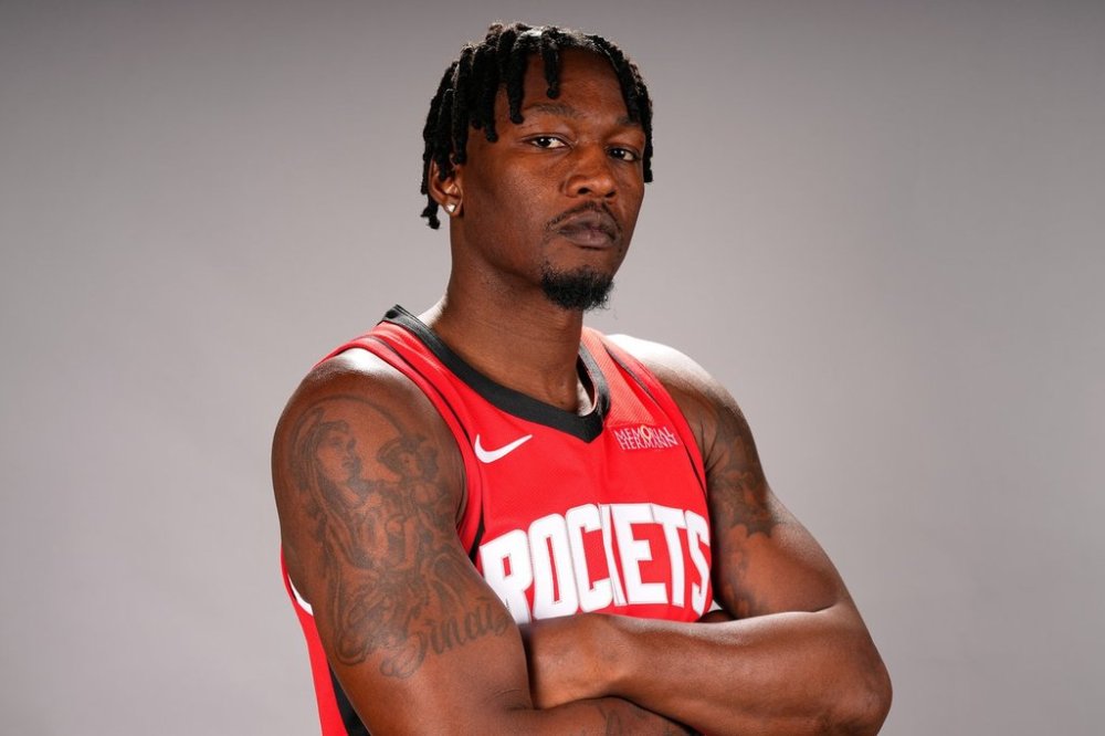 FILE - Houston Rockets' Dorian Finney-Smith poses for a photograph during an NBA basketball media day Monday, Sept. 29, 2025, in Houston. (AP Photo/David J. Phillip, File)