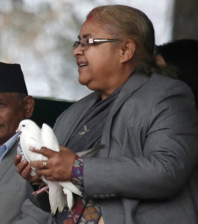 FILE - Chief Justice of the Supreme Court Sushila Karki takes part in celebrations of Democracy Day in Kathmandu, Nepal, Friday, Feb. 18, 2017. (AP Photo/Niranjan Shrestha, File)