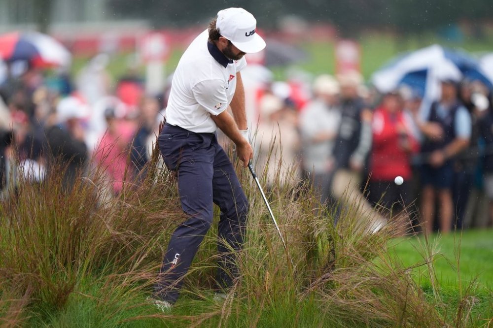 United States' Cameron Young hits from the rough on the 16th hole during a practice round at the Ryder Cup golf tournament, Thursday, Sept. 25, 2025, on the Bethpage Black golf course, in Farmingdale, N.Y. (AP Photo/Robert Bukaty)