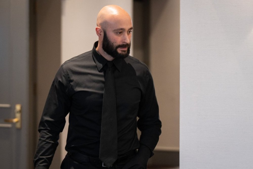 RCMP Constable Philip Dick leaves an RCMP code of conduct hearing on Wednesday, Sept. 17, 2025. THE CANADIAN PRESS/Ethan Cairns