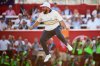 Europe's Shane Lowry celebrates after making the winning putt putt on the 18th hole during their singles match on the Bethpage Black golf course at the Ryder Cup golf tournament, Sunday, Sept. 28, 2025, in Farmingdale, N.Y. (AP Photo/Matt Slocum)