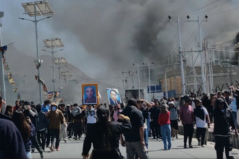 Smoke rises from buildings including the local office of India’s ruling Bharatiya Janata Party set ablaze during protests demanding greater autonomy from Indian government for the Himalayan territory in Leh town, Ladakh, India, Wednesday, Sept. 24, 2025. (AP Photo)