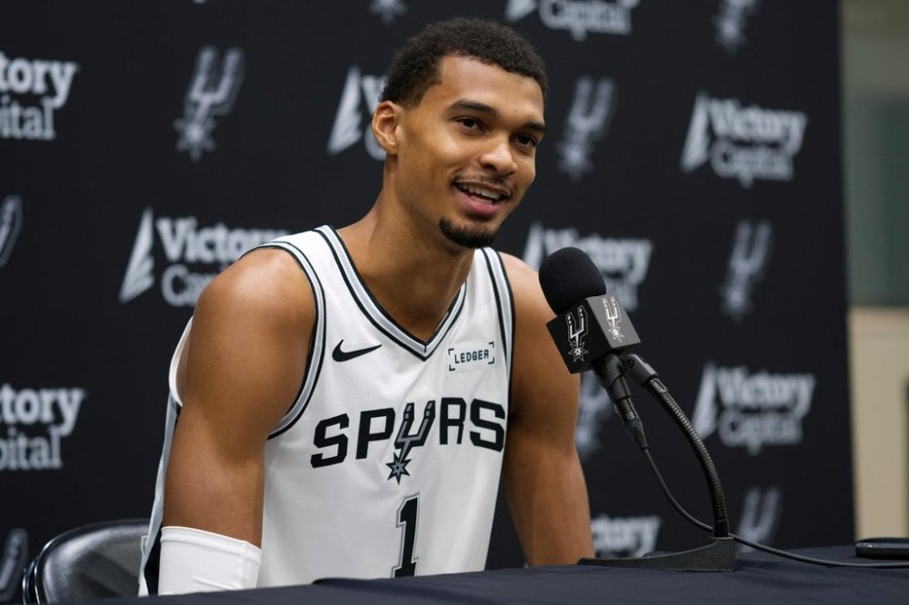 San Antonio Spurs forward Victor Wembanyama speaks to reporters during the NBA basketball team's media day in San Antonio, Monday, Sept. 29, 2025. (AP Photo/Darren Abate)