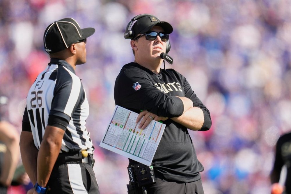 New Orleans Saints head coach Kellen Moore walks on the sideline in the second half of an NFL football game against the Buffalo Bills, Sunday, Sept. 28, 2025, in Orchard Park, N.Y. (AP Photo/Sue Ogrocki)