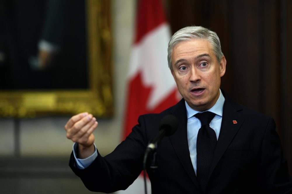 Minister of Finance and National Revenue Francois-Philippe Champagne speaks in the in the Foyer of the House of Commons on Parliament Hill in Ottawa, on Monday, Oct. 6, 2025. THE CANADIAN PRESS/Justin Tang