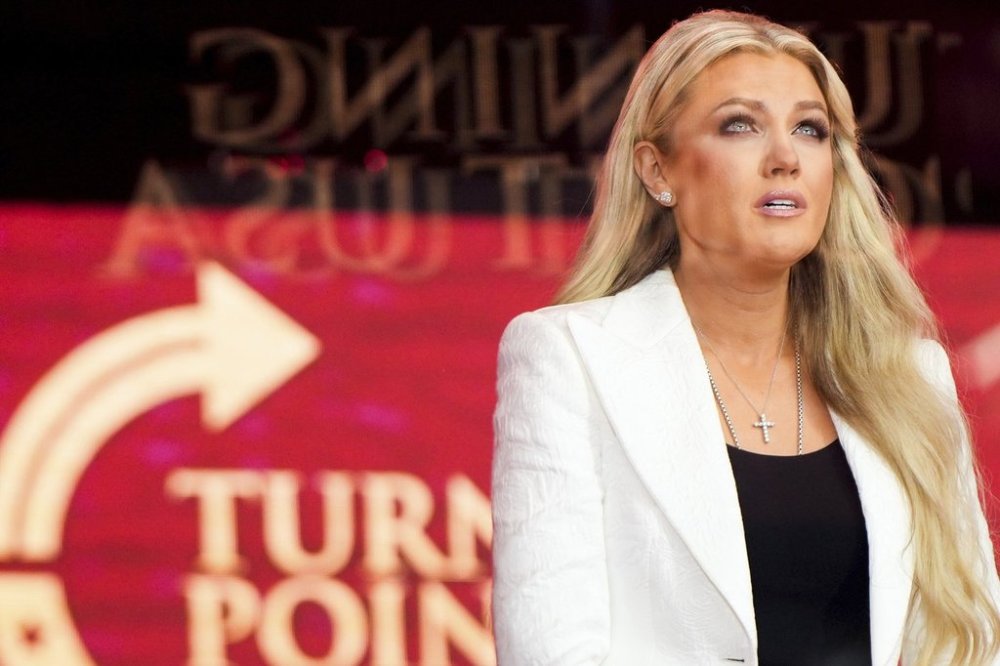 Erika Kirk reacts as she prepares to speak at a memorial for her husband, conservative activist Charlie Kirk, Sunday, Sept. 21, 2025, at State Farm Stadium in Glendale, Ariz. (AP Photo/Julia Demaree Nikhinson)