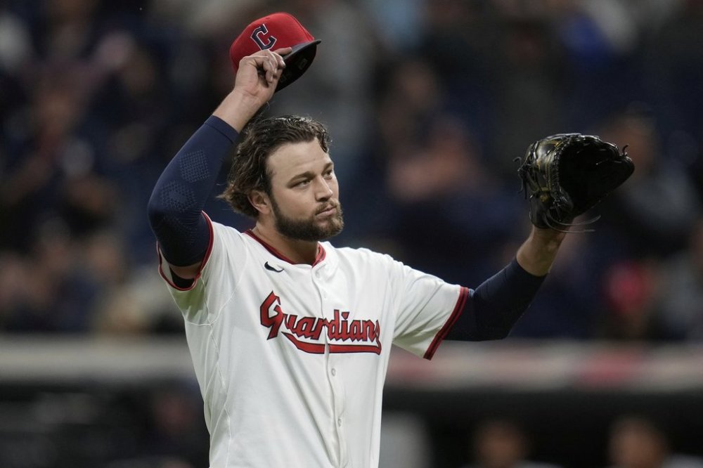 Cleveland Guardians starting pitcher Slade Cecconi walks off the mound after the eighth inning of a baseball game against the Kansas City Royals in Cleveland, Monday, Sept. 8, 2025. (AP Photo/Sue Ogrocki)
