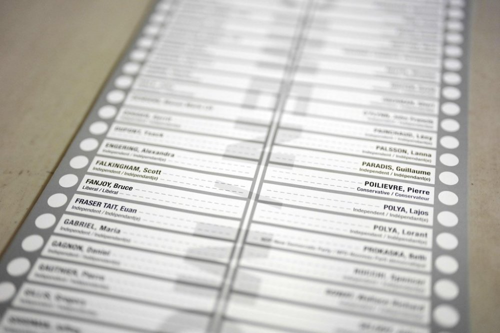 An example of a ballot for the riding of Carleton, showing the names of Conservative Leader Pierre Poilievre and Liberal Party of Canada candidate Bruce Fanjoy, is seen at the Elections Canada Distribution Centre on the day of the federal election in Ottawa on April 28, 2025. THE CANADIAN PRESS/Justin Tang