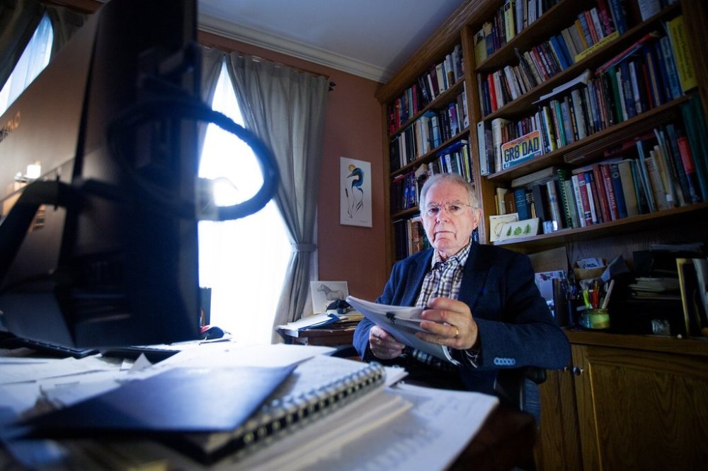 Jack Harris, a former member of Parliament for the NDP, reads the Churchill Falls memorandum of understanding with Quebec, at his home office in St. John's, N.L., on Friday, Sept. 12, 2025. THE CANADIAN PRESS/Paul Daly
