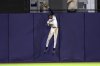 Tampa Bay Rays outfielder Chandler Simpson makes a leaping catch on a fly ball from Toronto Blue Jays' Alejandro Kirk during the fourth inning of a baseball game Wednesday, Sept. 17, 2025, in Tampa, Fla. (AP Photo/Mike Carlson)