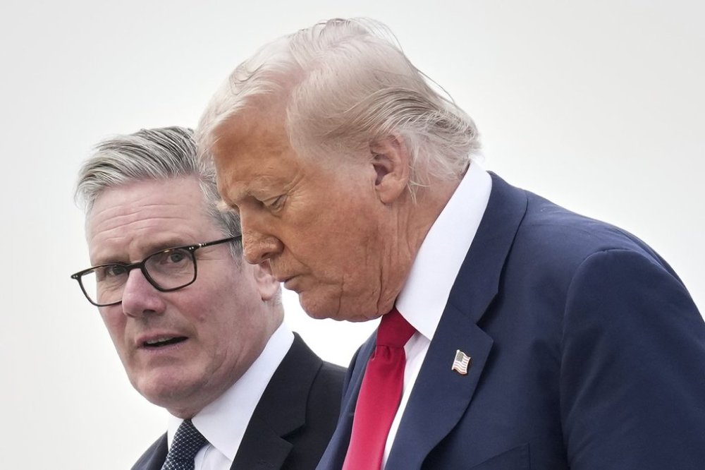 FILE - President Donald Trump and Britain's Prime Minister Keir Starmer exit Air Force One as they arrive at Royal Air Force Lossiemouth en route to Aberdeen, Scotland Monday, July 28, 2025. (AP Photo/Jacquelyn Martin, File)