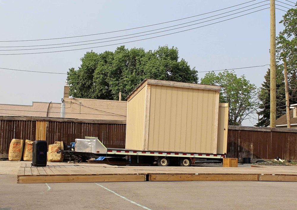 The shed was on a flatbed trailer behind a chain-locked gate at 243 Henderson Hwy. The absence of the shed and trailer was noticed Monday night. (Facebook)
