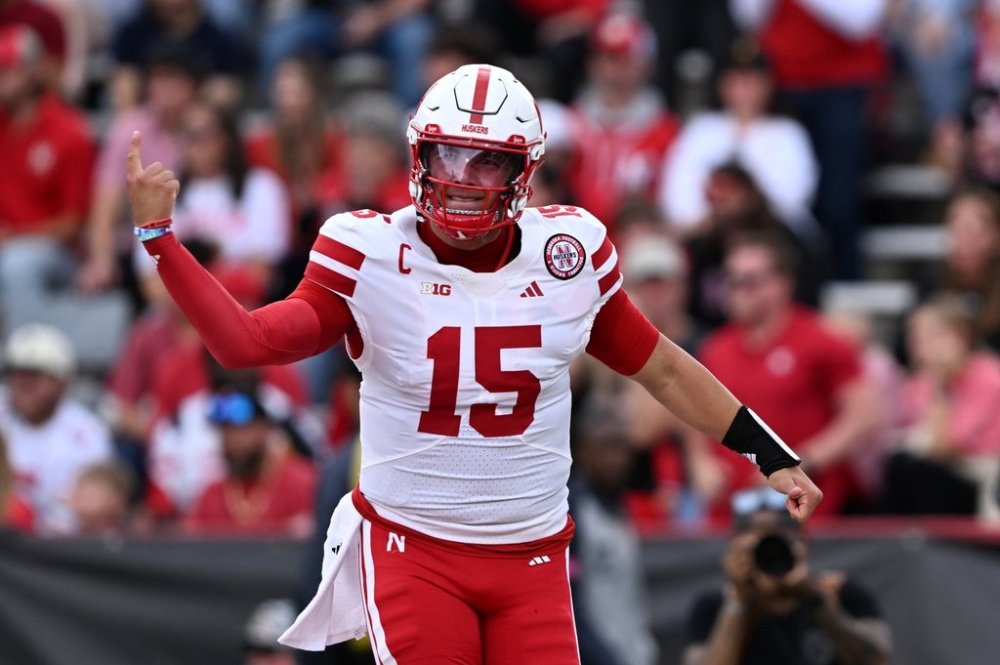 Nebraska quarterback Dylan Raiola (15 ) reacts after throwing a a pass for a touchdown against Maryland during the first half of a NCAA college football game, Saturday, Oct. 11, 2025, in College Park, Md. (AP Photo/Gail Burton)