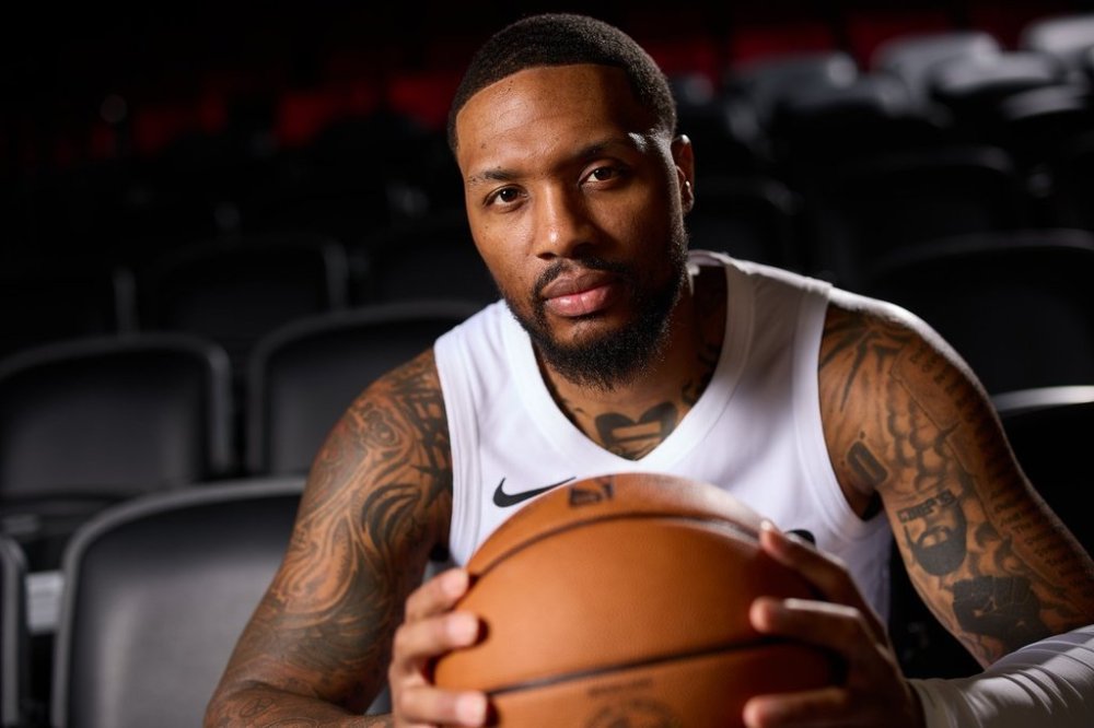 Portland Trail Blazers guard Damian Lillard poses for photos during the NBA basketball team's media day in Portland, Ore., Monday, Sept. 29, 2025. (AP Photo/Craig Mitchelldyer)