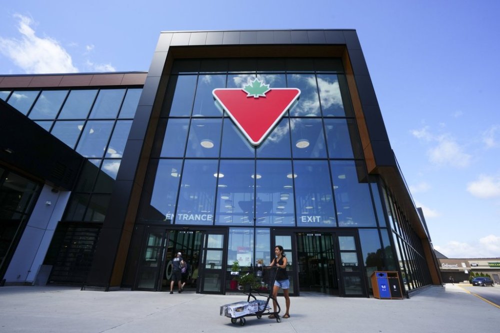 Shoppers come and go from a Canadian Tire store in Ottawa on Friday, Aug. 11, 2023. THE CANADIAN PRESS/Sean Kilpatrick