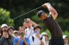 Xander Schauﬀele, of the U.S., tees off on the second hole during the fourth round of the Baycurrent Classic golf tournament at the Yokohama Country Club in Yokohama, near Tokyo, Sunday, Oct. 12, 2025. (AP Photo/Hiro Komae)