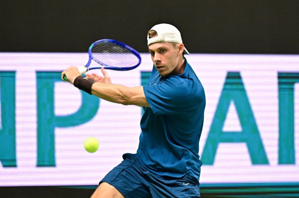 Canada's Denis Shapovalov plays a return against Norway's Casper Ruud during a men's singles semifinal tennis match at the BNP Paribas Nordic Open tennis tournament in Stockholm, Sweden, Saturday, Oct. 18, 2025. (Magnus Lejhall/TT via AP)