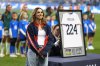 United States' Alex Morgan stands during her retirement ceremony before an international friendly women's soccer match between the United States and Portugal, Thursday, Oct. 23, 2025, in Chester, Pa. (AP Photo/Matt Slocum)