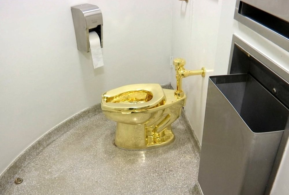 FILE - This Sept. 16, 2016 file image made from a video shows the 18-karat toilet, titled