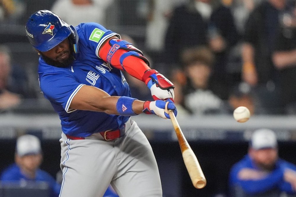 Toronto Blue Jays' Vladimir Guerrero Jr. connects for a single to drive in a run against the New York Yankees during the first inning of Game 4 of baseball's American League Division Series, Wednesday, Oct. 8, 2025, in New York. (AP Photo/Frank Franklin II)