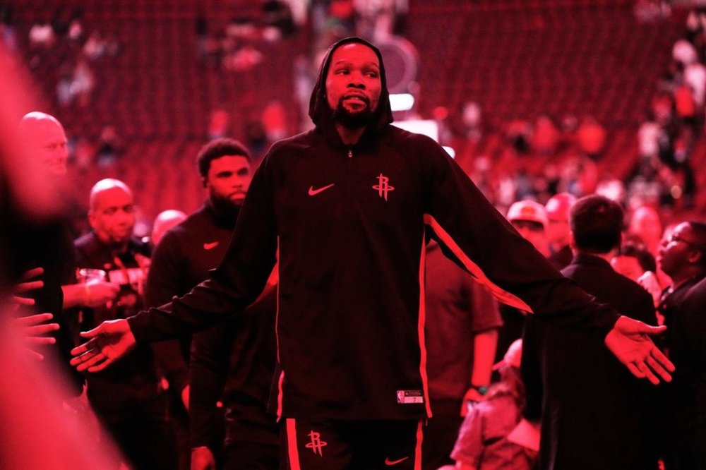 Houston Rockets forward Kevin Durant (7) leaves the court after an NBA basketball preseason game against the Utah Jazz in Houston, Wednesday, Oct. 8, 2025. (AP Photo/Ashley Landis)