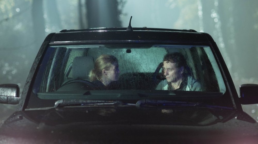 This image released by XYZ Films shows Rosamund Pike, left, and Matthew Rhys in a scene from