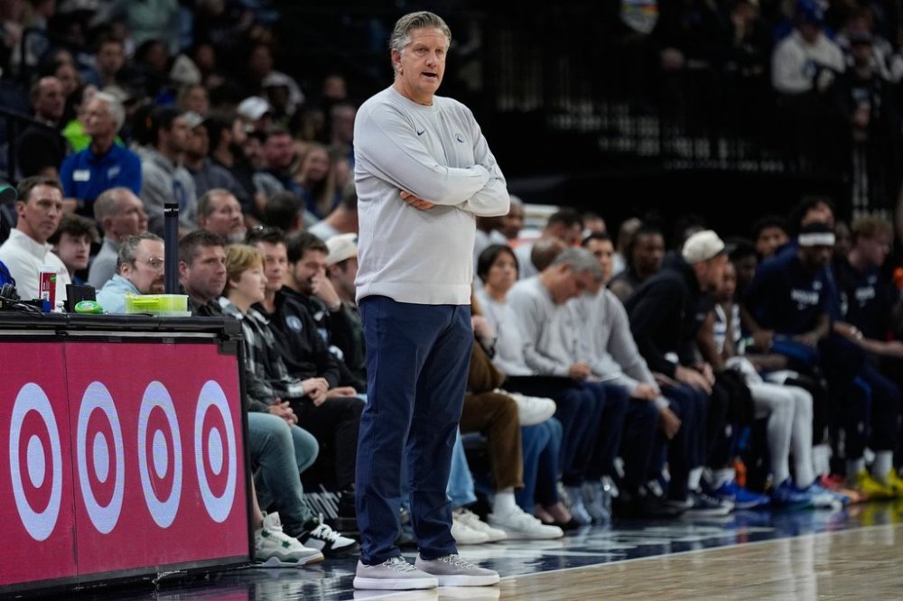 Minnesota Timberwolves head coach Chris Finch watches play during the first half of an NBA basketball preseason game against the Indiana Pacers, Tuesday, Oct. 7, 2025, in Minneapolis. (AP Photo/Abbie Parr)