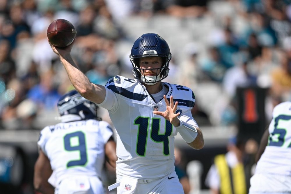 Seattle Seahawks quarterback Sam Darnold (14) throws a pass during the first half of an NFL football game against the Jacksonville Jaguars, Sunday, Oct. 12 2025, in Jacksonville, Fla. (AP Photo/Phelan M. Ebenhack)