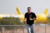FILE - Cleveland Guardians pitcher Paul Sewald runs during spring training baseball practice at the team's training facility in Goodyear, Ariz., Feb. 16, 2025. (AP Photo/Carolyn Kaster, File)