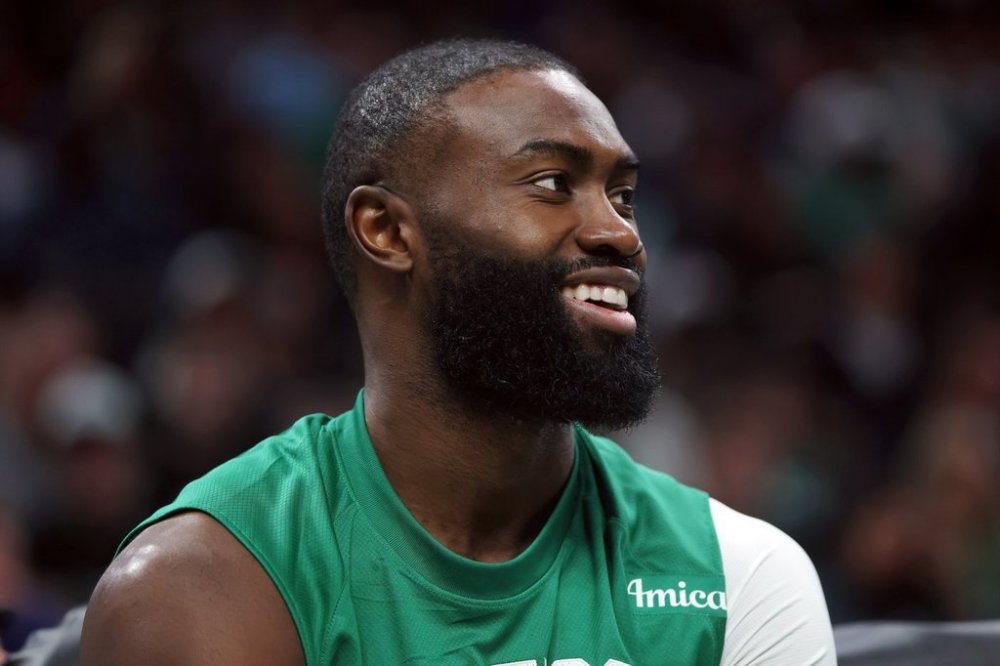 Boston Celtics' Jaylen Brown sits on the bench during the second half of a preseason NBA basketball game against the Cleveland Cavaliers, Sunday, Oct. 12, 2025, in Boston. (AP Photo/Michael Dwyer)