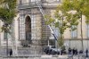 Police officers work by a basket lift used by thieves Sunday, Oct. 19, 2025 at the Louvre museum in Paris. (AP Photo/Thibault Camus)