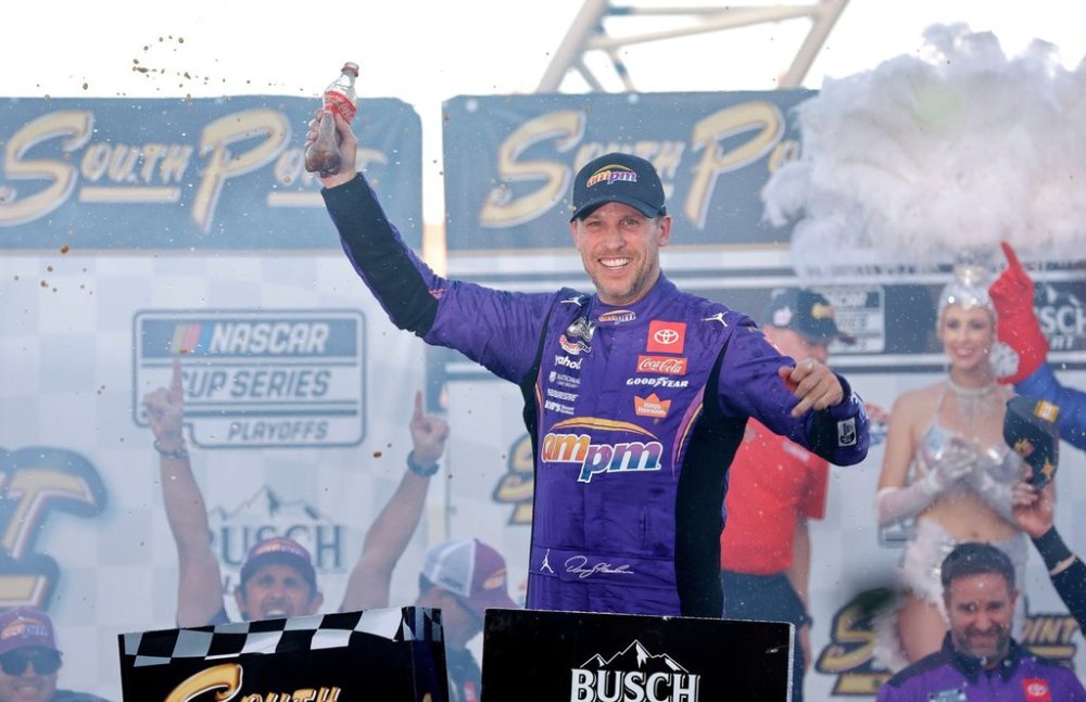 Denny Hamlin celebrates in victory lane after winning a NASCAR Cup Series auto race Sunday, Oct. 12, 2025, in Las Vegas. (AP Photo/Steve Marcus)
