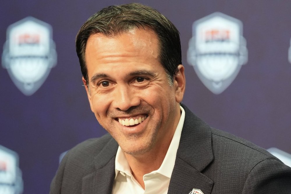 Erik Spoelstra, the head coach of the Miami Heat, smiles as he announces that he has accepted the USA Basketball men's national team head coach position during a news conference Thursday, Oct. 16, 2025, in Miami. (AP Photo/Marta Lavandier)