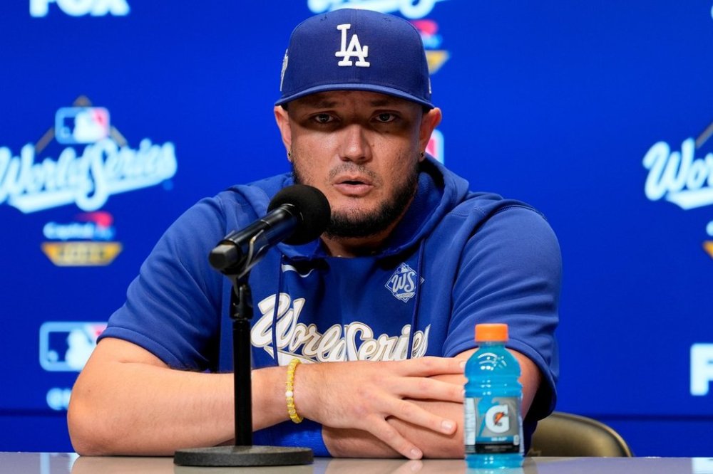 Los Angeles Dodgers' Miguel Rojas speaks to the media prior to Game 6 of baseball's World Series against the Toronto Blue Jays, Friday, Oct. 31, 2025, in Toronto. (AP Photo/Ashley Landis)