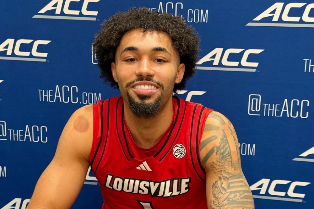 Louisville guard J'Vonne Hadley speaks at the ACC college basketball media days, Wednesday, Oct. 8 2025, in Charlotte, N.C. (AP Photo/Steve Reed)